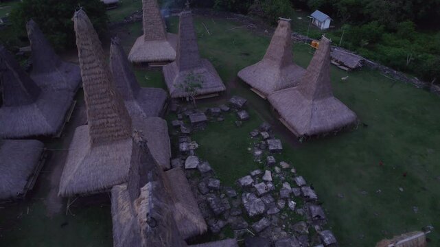 Aerial view of traditional village with thatch huts and grass roofs, Ratenggaro, Sumba, Indonesia.