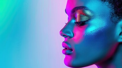 Close-up of a woman's face with vibrant neon makeup, illuminated in colorful, artistic light against a pastel background.
