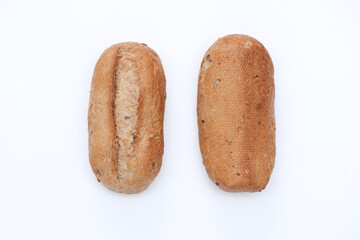 Appetizing rye buns on white background