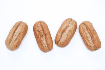 Appetizing rye buns on white background