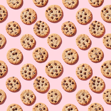 Seamless pattern with chocolate chip cookies on white background, top view, minimal flat lay style.