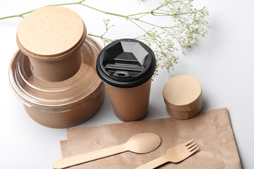 Eco cardboard containers for food and drinks on white background