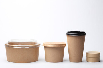 Eco cardboard containers for food and drinks on white background