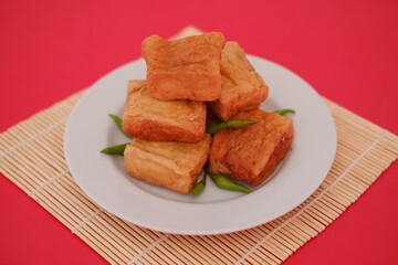 Tahu Bakso, Indonesian traditional snack made from tofu and beef. Served in white plate.