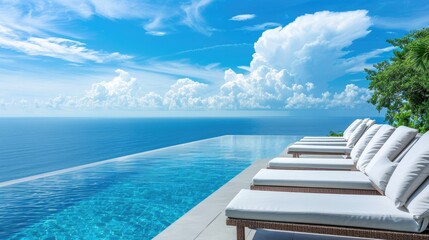 Fototapeta premium Luxury infinity pool with ocean view. Perfect for travel, vacation, or relaxation.