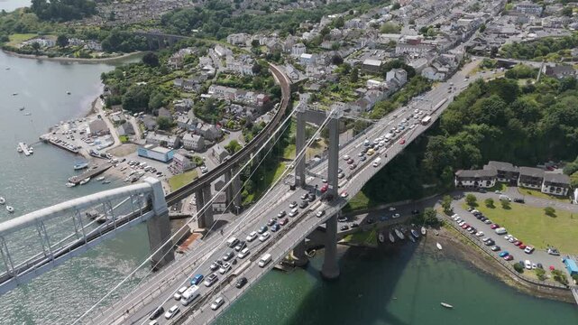 Drone view of traffic queueing on the Tamar Bridge from Saltash to Plymouth, UK