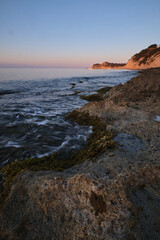seascape rocky beach at sunset