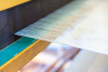 cocoons of white silkworms bred to produce silk. raw silk,Traditional textile manufacture Weaving thread for the textile industry.