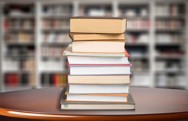 stack of reading books at library background