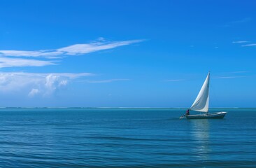 Serene Sailboat Journey on a Clear Blue Sea