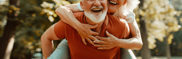 happy senior couple in park