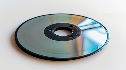 Reflecting light from an unidentified origin, an optical disc displays a vibrant gradient on its surface