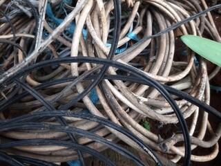 a collection of used cable reels