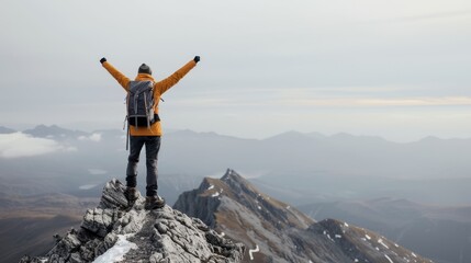 Obraz premium A hiker standing triumphantly on a mountain summit with arms raised, overlooking expansive mountain vistas, capturing the essence of adventure, achievement, and nature’s beauty.