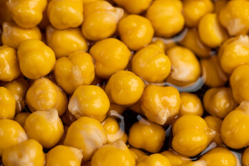 chickpeas porridge with honey during cooking