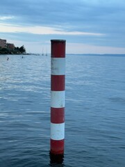 a red-white Pole