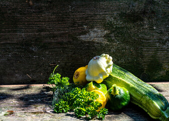 still life with various vegetables on a wooden board, healthy vegetarian diet