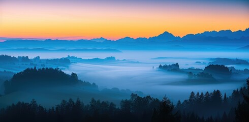 Fototapeta premium Tranquil Dawn Over Misty Mountain Range