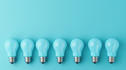 Idea concept with light bulbs on blue background.
