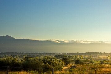 A foggy morning in Croatia. Landscape with fog and mountains in the background.