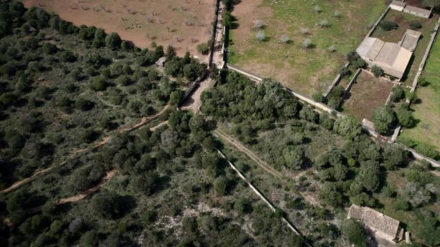 Aerial view of rural fields and vegetation near Cala Varques, Mallorca, Spain.
