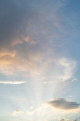 Morning cloudy sky with sun rays. Copy space wallpaper.