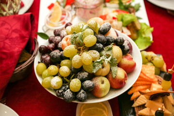 Bright festive table a restaurant with dishes and cutlery beautifully arranged.