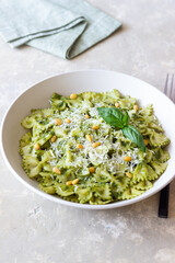 Farfalle pasta with pesto sauce. Healthy eating. Vegetarian food.