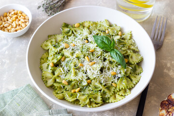 Farfalle pasta with pesto sauce. Healthy eating. Vegetarian food.