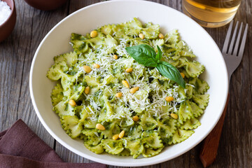 Farfalle pasta with pesto sauce. Healthy eating. Vegetarian food.