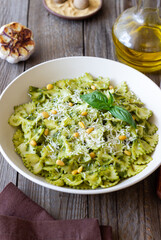 Farfalle pasta with pesto sauce. Healthy eating. Vegetarian food.