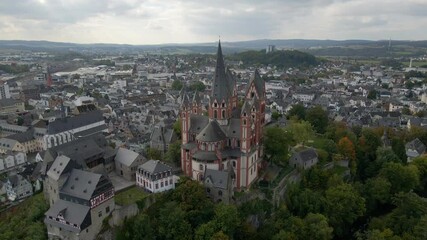 Aerial view of medieval castle, church, and cathedral overlooking river in historic Limburg an der Lahn, Germany.