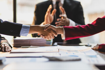 Handshake, Business cooperation at a meeting of business people. Business partners shaking hands in a meeting.