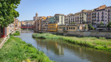 Girona, Spain - 18 July, 2024: Colorful buildings along the River Onyar, Girona, Catalonia