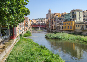Girona, Spain - 18 July, 2024: Colorful buildings along the River Onyar, Girona, Catalonia