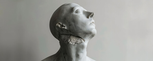 Antique marble sculpture of an unknown headless figure, elegantly displayed in a museum against a clean white wall. The minimalist background draws attention to the intricate details of the statue.