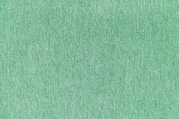 Closeup, macro of green jeans denim fabric texture background, cloth with diagonal weawing