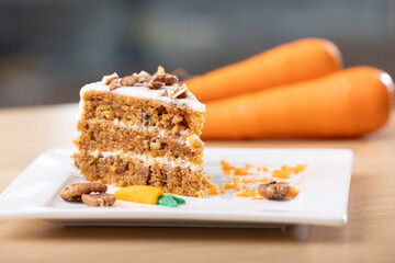 Delicious Slice of Carrot Cake with Cream Cheese Frosting. A mouth-watering close-up of a slice of carrot cake with rich cream cheese frosting. The cake is beautifully layered with moist, carrot