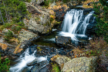 Naklejka premium Waterfall in the mountains