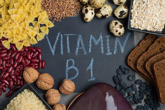 An example of a range of products containing vitamin B1. The concept of proper balanced nutrition. Products with the inscription B1 on a dark background, horizontal.