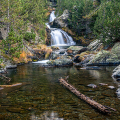 Aaterfall in autumn mountains