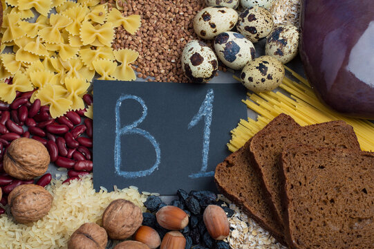 An example of a range of products containing vitamin B1. The concept of proper balanced nutrition. Products with the inscription B1 on a dark background, horizontal.