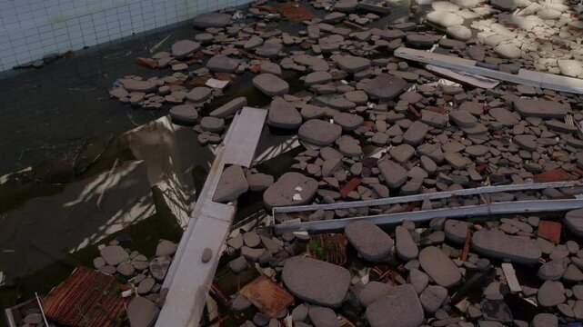 Aerial view of abandoned hotel with broken swimming pool, Kupari, Dubrovnik-Neretva, Croatia.