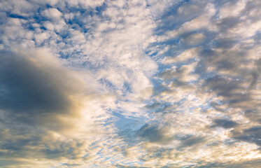 Morning clouds and sky background,Real majestic sunrise sundown sky background with gentle colorful clouds without birds. Panoramic, big size