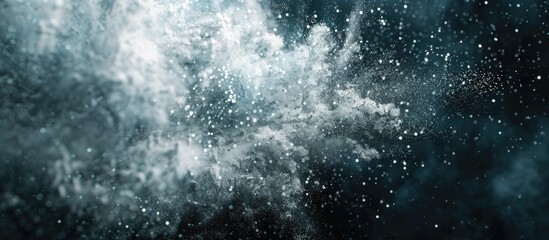 Obraz premium Freeze-frame of an abstract white dust explosion on a dark backdrop with a glittering white texture, ideal for copy space image.
