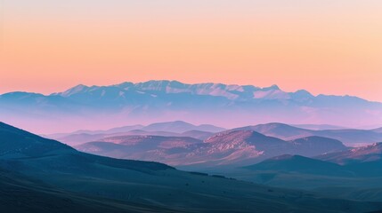 Fototapeta premium Scenic view of a mountain range during sunset