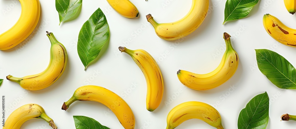 Poster top-down view of a seamless banana pattern with leaves, set against a white backdrop ideal for addin