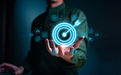 Businessman with target arrow virtual digital technology icon, business investment objectives and...