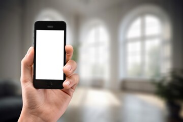 Business man using phone at home