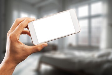 Business man using phone at home